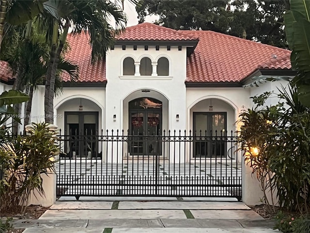 view of gate with french doors