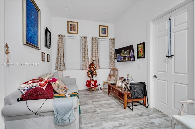 living area with light hardwood / wood-style floors