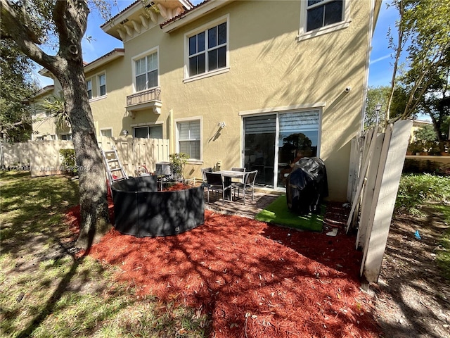 rear view of house featuring a patio area