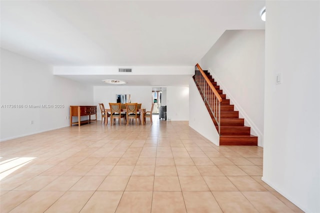 interior space featuring light tile patterned flooring