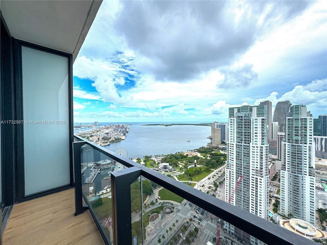 balcony featuring a water view