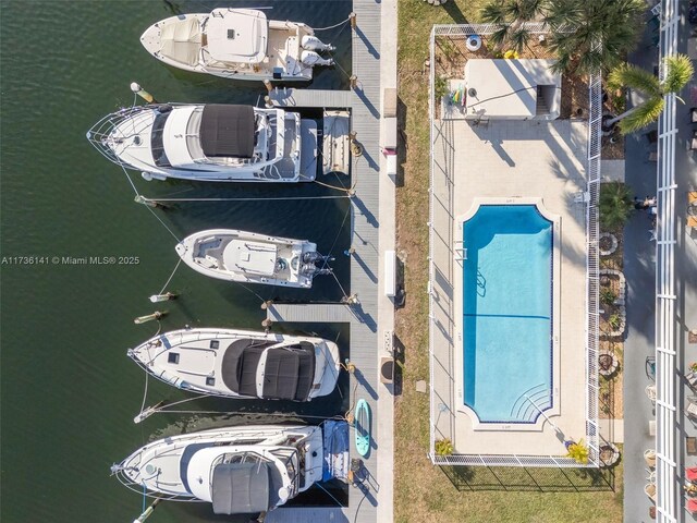 birds eye view of property featuring a water view