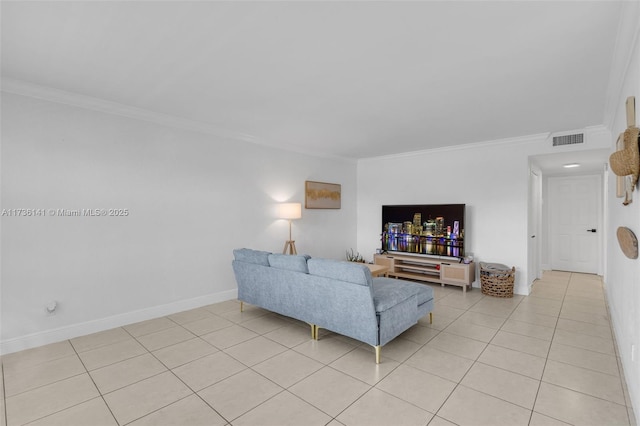 living area with crown molding, light tile patterned floors, baseboards, and visible vents