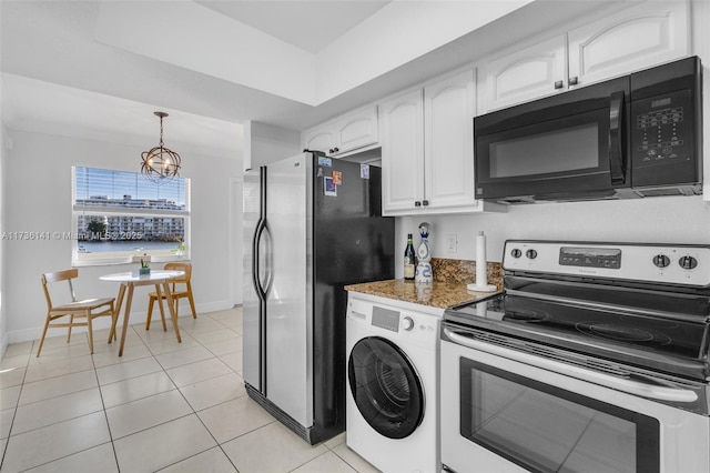 kitchen with pendant lighting, stainless steel appliances, light tile patterned flooring, white cabinets, and washer / clothes dryer