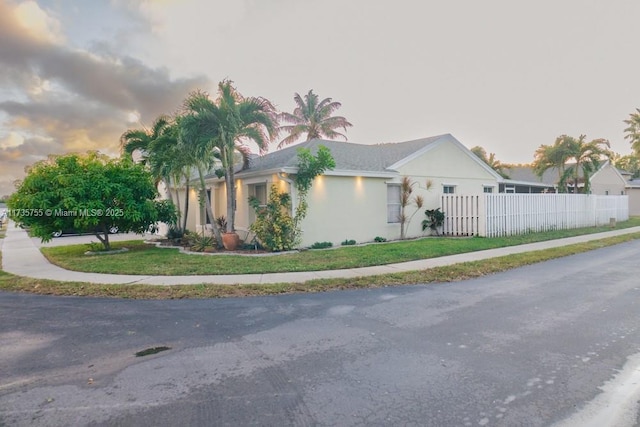 view of property exterior at dusk