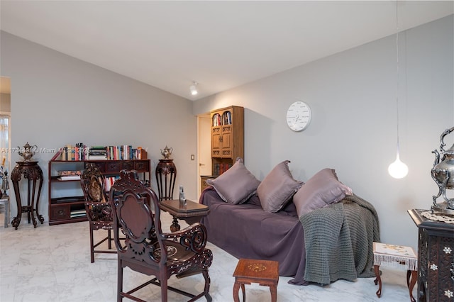 living room with lofted ceiling