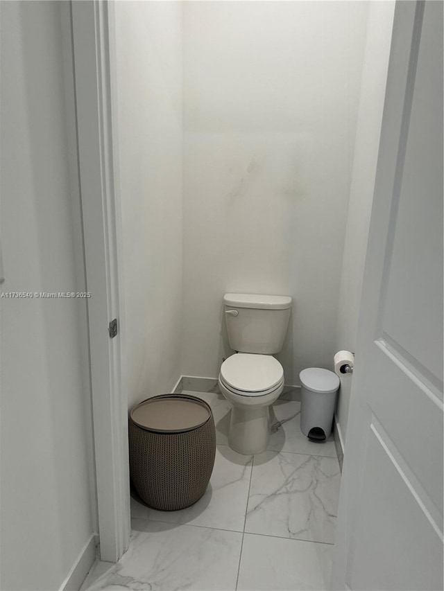 bathroom featuring toilet