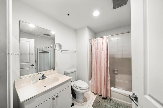 full bathroom with vanity, shower / bathtub combination with curtain, tile patterned floors, and toilet