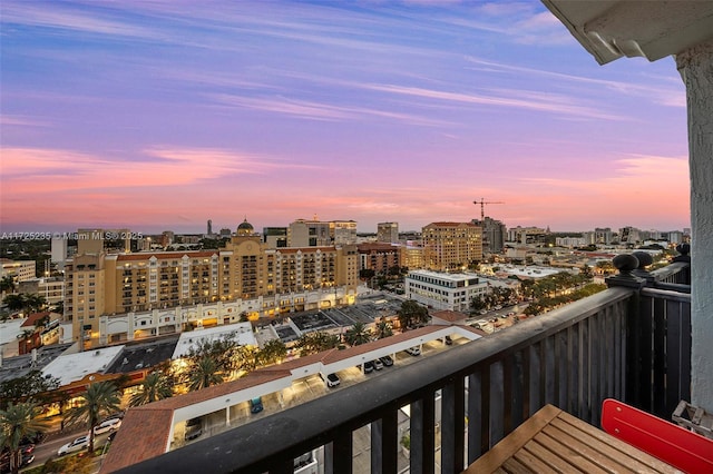 view of balcony at dusk