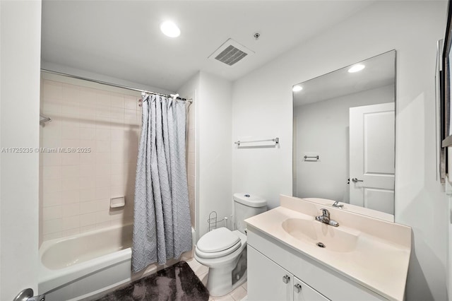 full bathroom featuring shower / bath combo, vanity, and toilet