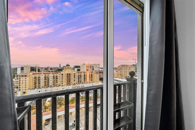 view of balcony at dusk