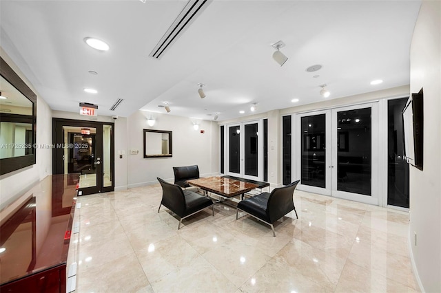 dining space featuring french doors