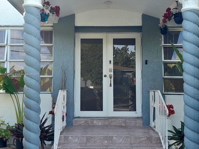 view of exterior entry with french doors