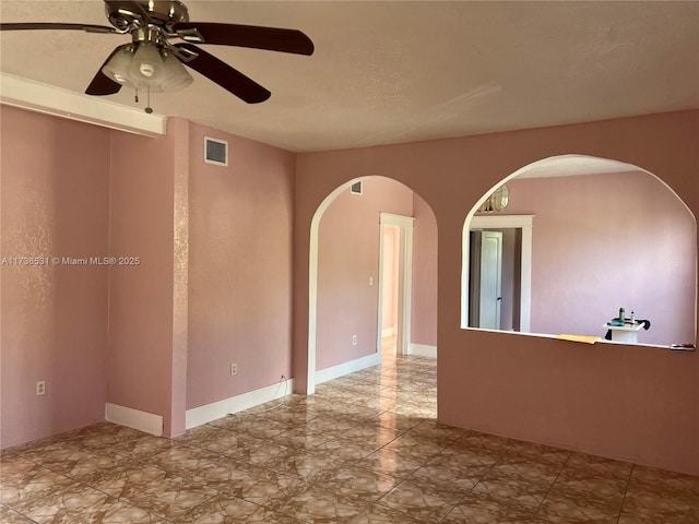 empty room with ceiling fan