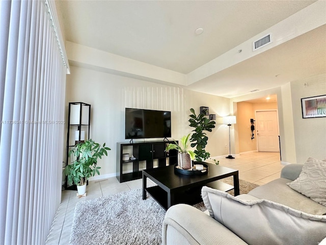 living room featuring light tile patterned floors