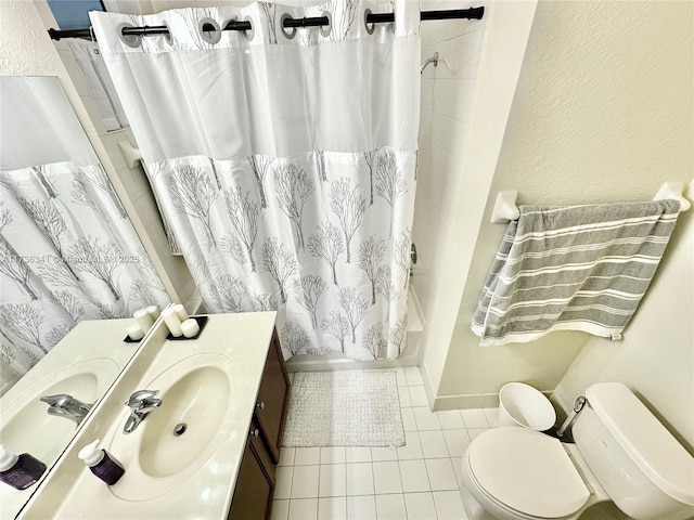 full bathroom featuring tile patterned flooring, vanity, shower / bath combination with curtain, and toilet