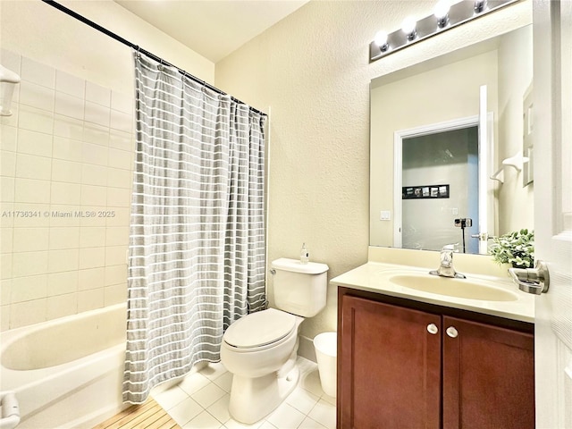 full bathroom with toilet, tile patterned floors, shower / bathtub combination with curtain, and vanity