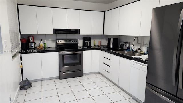 kitchen featuring sink, stainless steel range with electric stovetop, refrigerator, white dishwasher, and white cabinets