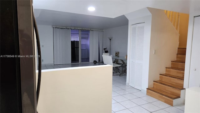 interior space featuring light tile patterned floors