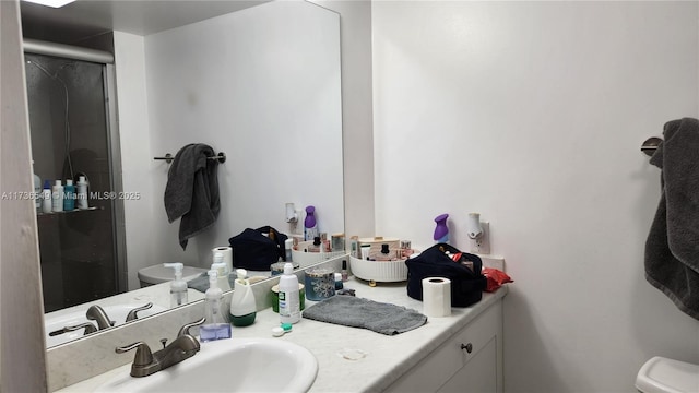 bathroom with walk in shower, vanity, and toilet