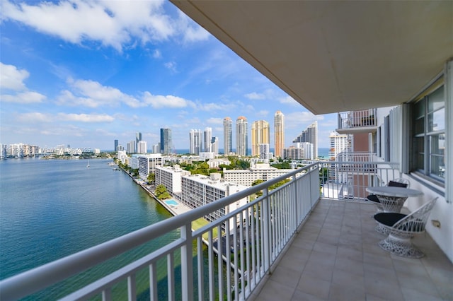 balcony featuring a water view