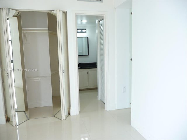 interior space featuring light tile patterned floors