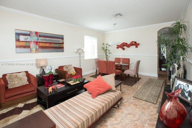 living room featuring crown molding