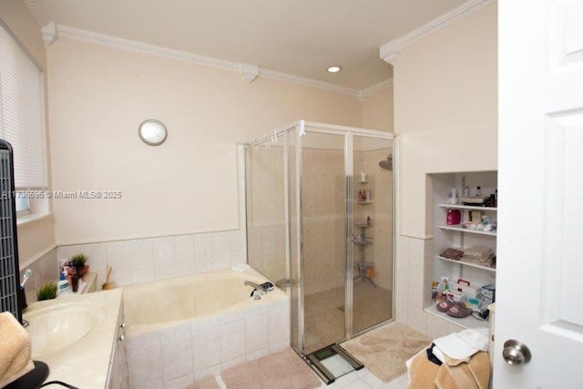 bathroom featuring independent shower and bath, crown molding, and vanity