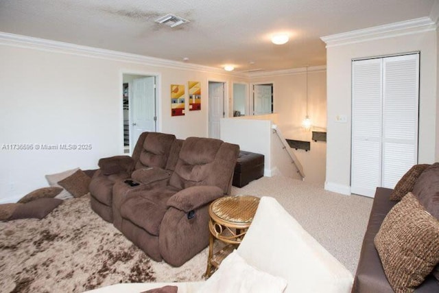 living room with ornamental molding and carpet