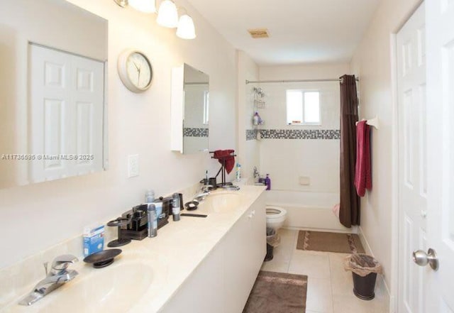 full bathroom featuring shower / tub combo with curtain, tile patterned floors, toilet, and vanity