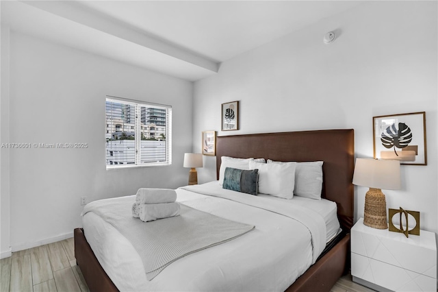 bedroom featuring wood-type flooring