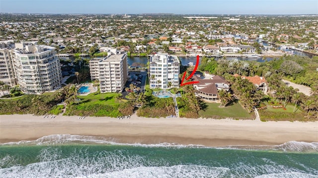 bird's eye view featuring a beach view and a water view