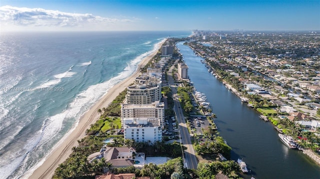 aerial view with a beach view and a water view