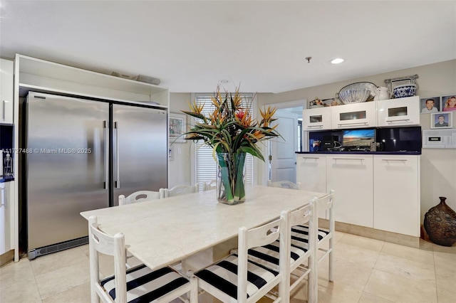 dining room featuring light tile patterned floors