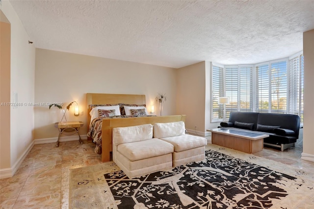 bedroom with a textured ceiling