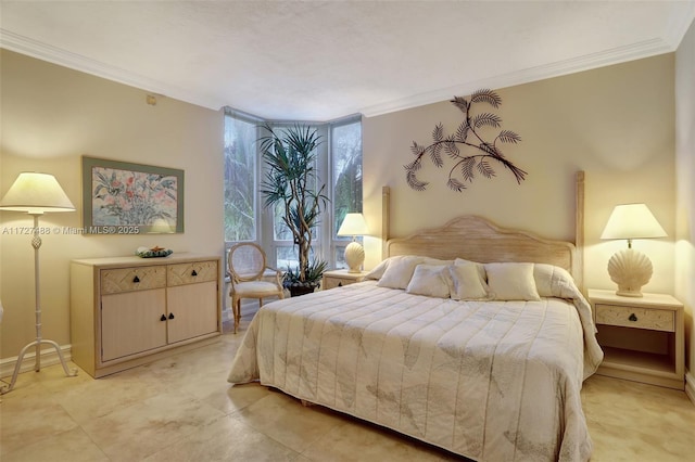 bedroom with crown molding and a wall of windows