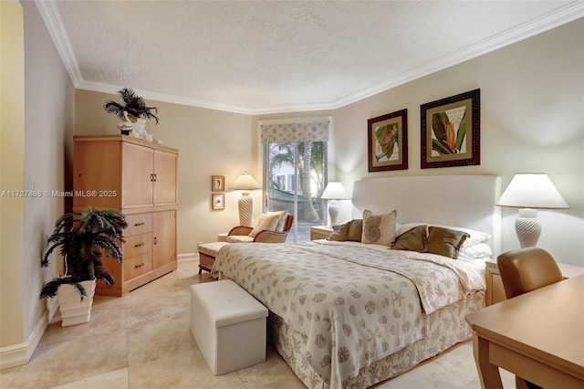 bedroom featuring ornamental molding and a textured ceiling