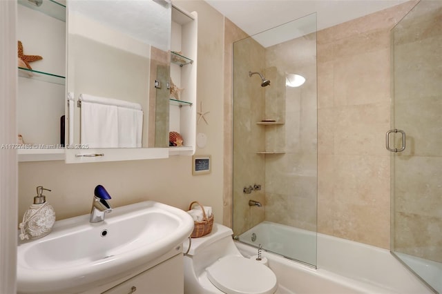 full bathroom with toilet, vanity, and shower / bath combination with glass door