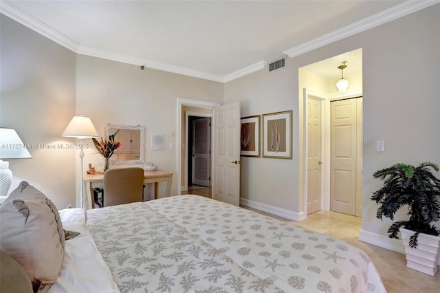 bedroom featuring baseboards, visible vents, and ornamental molding