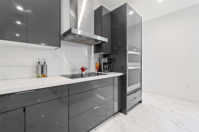 kitchen with black electric stovetop, double oven, and wall chimney exhaust hood