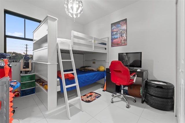 bedroom with light tile patterned floors