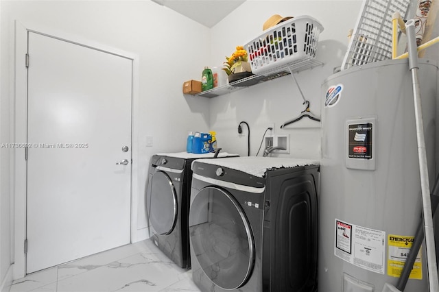 clothes washing area with independent washer and dryer and electric water heater