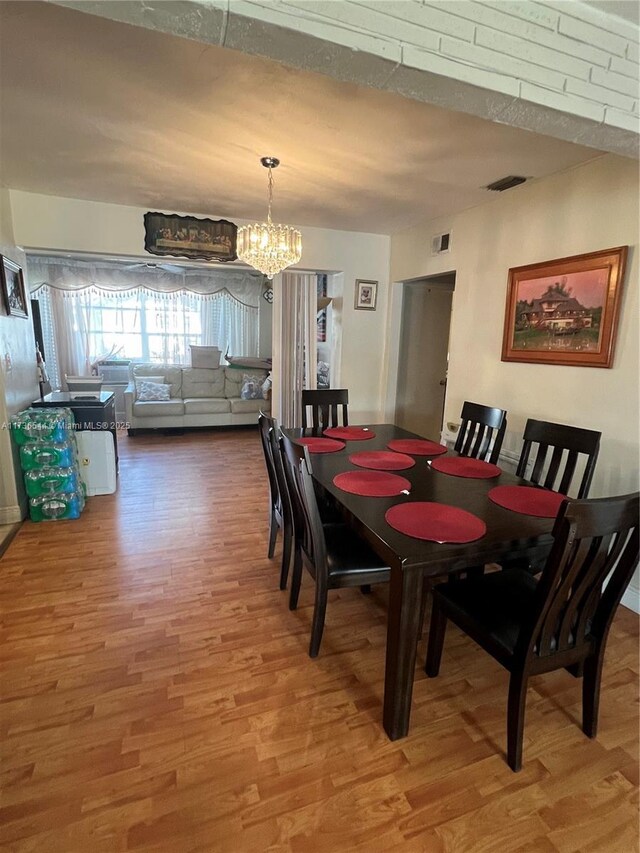 kitchen featuring light tile patterned flooring, ornamental molding, appliances with stainless steel finishes, and ceiling fan