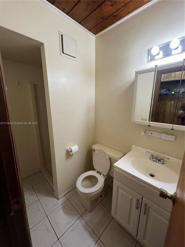 full bathroom with toilet, tile patterned flooring, a shower stall, and vanity