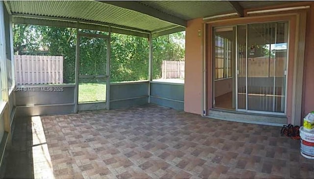 view of unfurnished sunroom