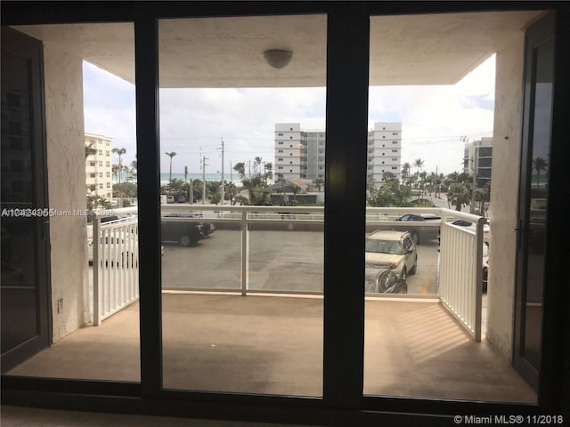 balcony featuring a view of city