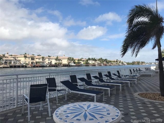 view of patio featuring a water view