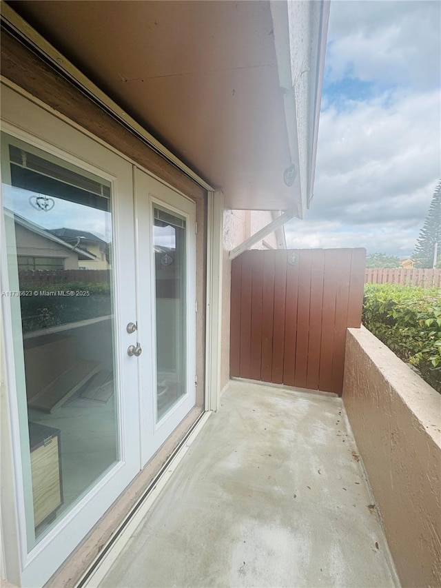 balcony featuring french doors