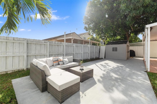 view of patio with a storage shed and outdoor lounge area