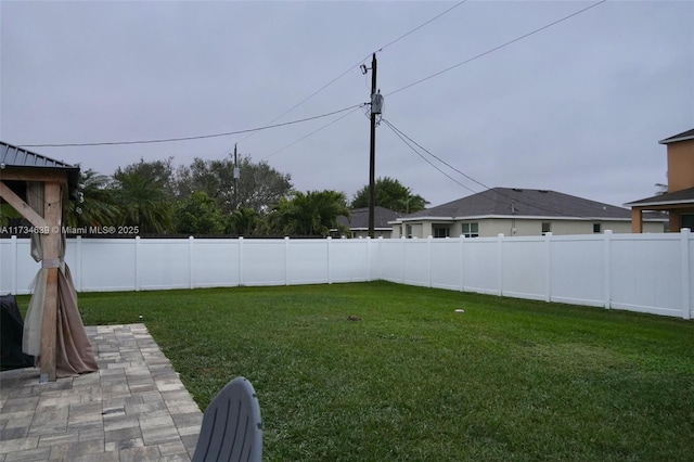 view of yard with a patio area